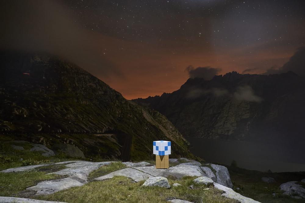 DER EINSTEIN® modular unit photographed at dusk in an alpine setting, warm evening light
